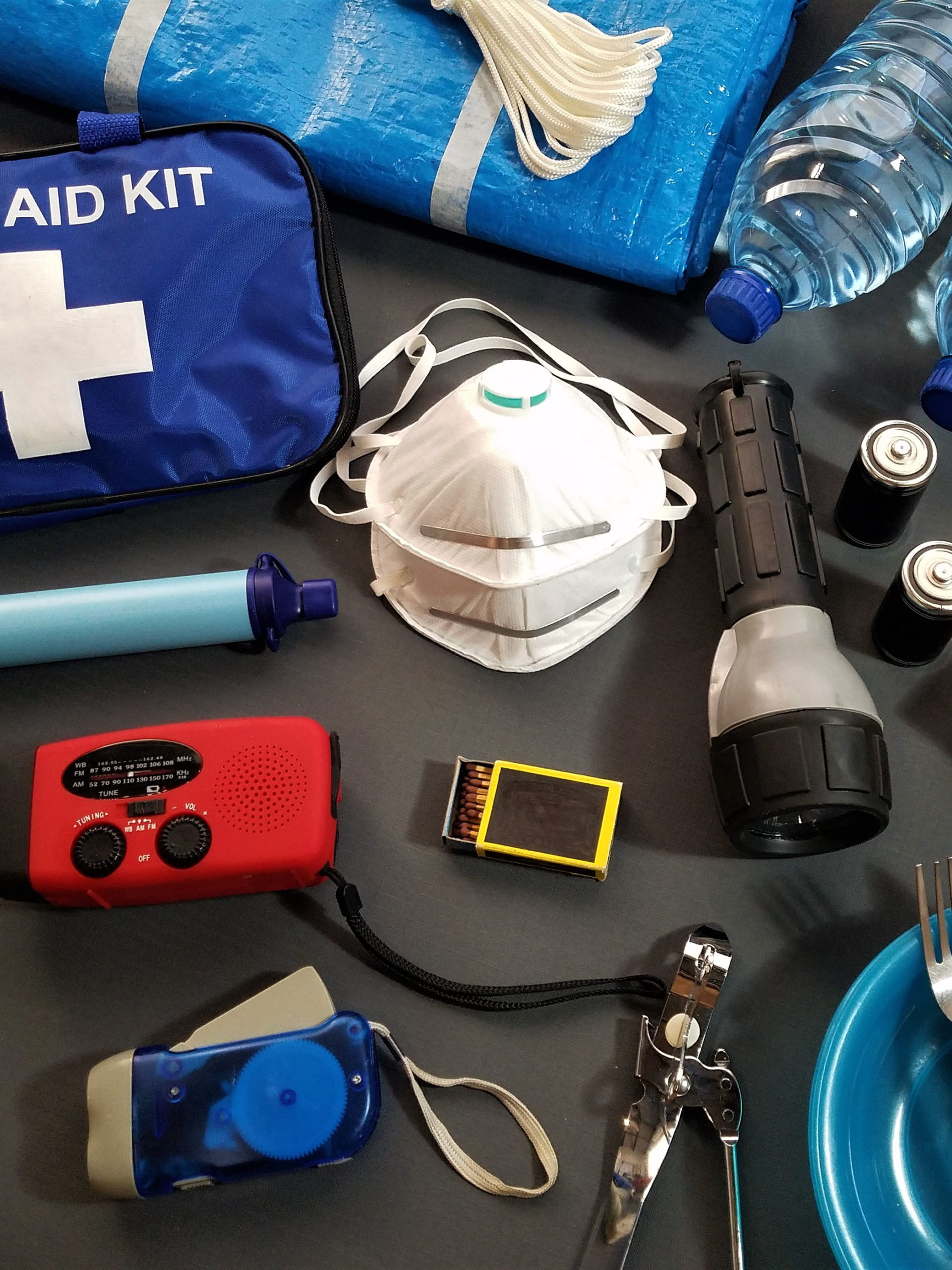 flat lay of earthquake safety kit and rations