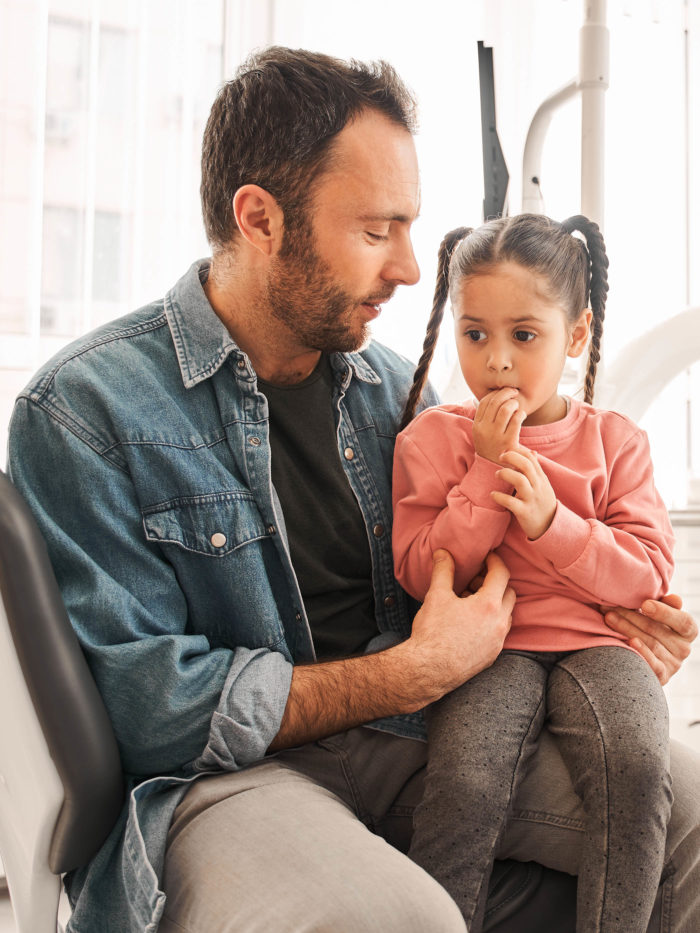 concerned little girl with dad