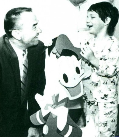 Disney illustrator Bob Moore with a CHOC patient.