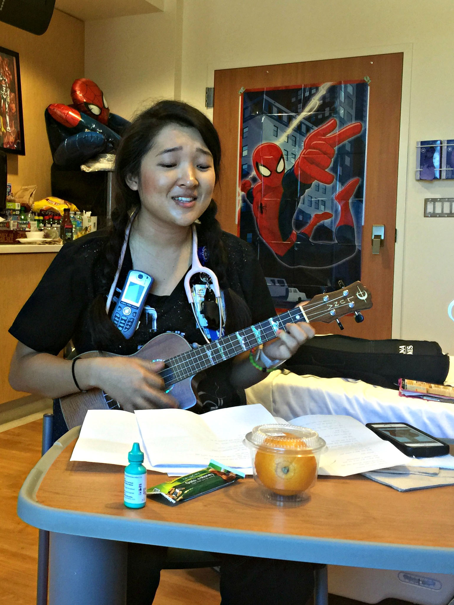CHOC nurse Julia serenades patient with ukulele