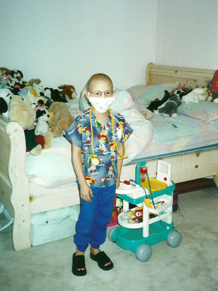 Old photo of CHOC patient turned CHOC oncology nurse Shaina in her bedroom