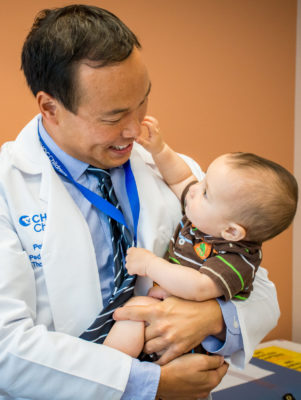Dr. Peter Yu pediatric surgeon and patient