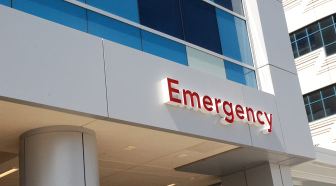 sign outside CHOC's emergency department that says "Emergency"