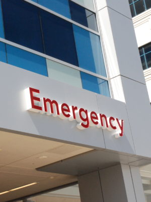sign outside CHOC's emergency department that says "Emergency"