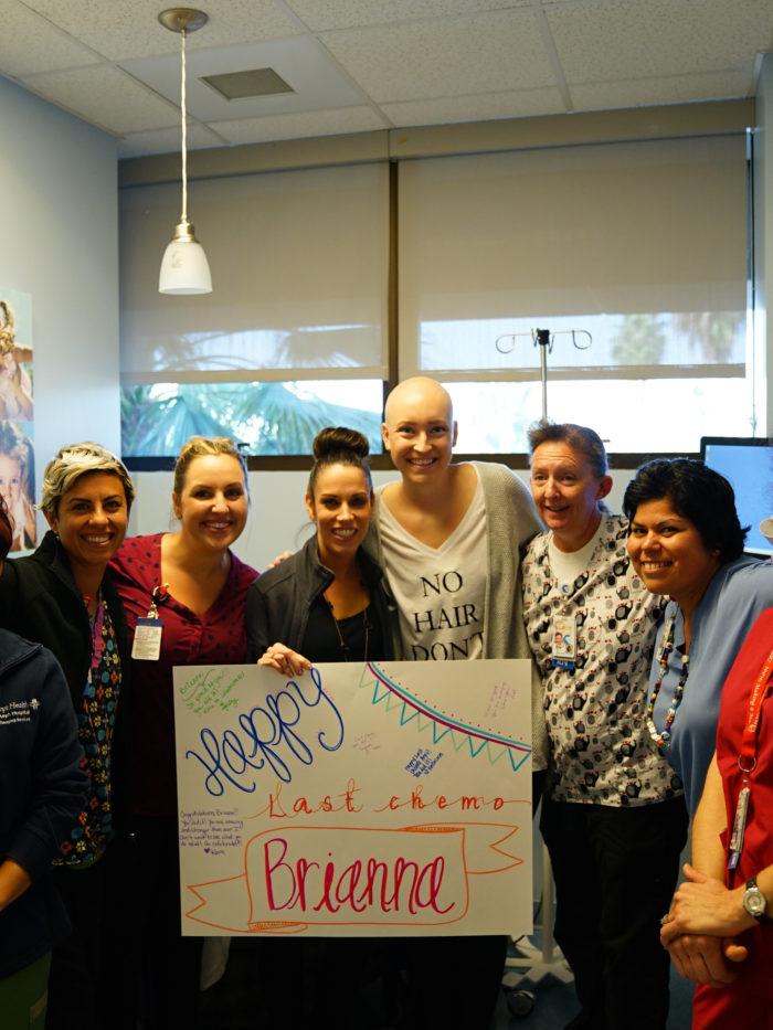 CHOC patient Brianna with team of CHOC nurses celebrating her last chemo treatment