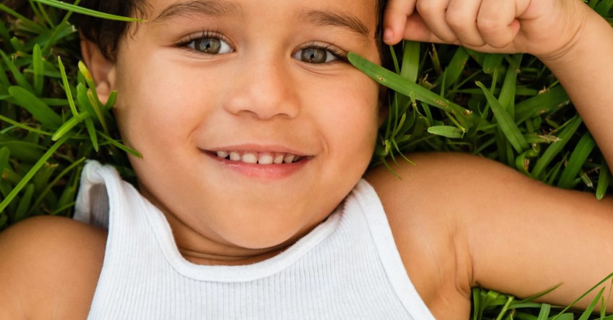 boy_in_backyard_playing