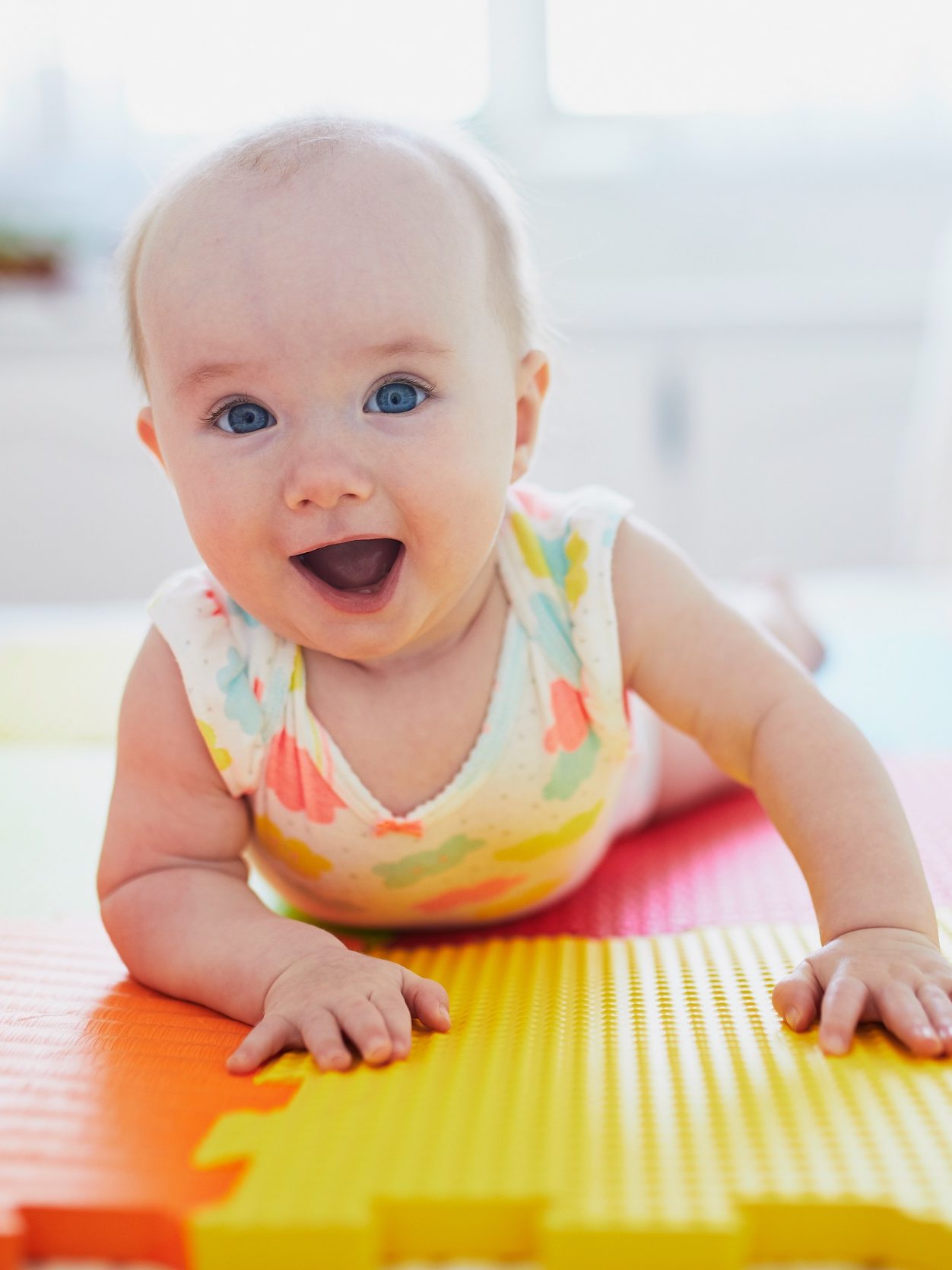 baby crawling and smiling