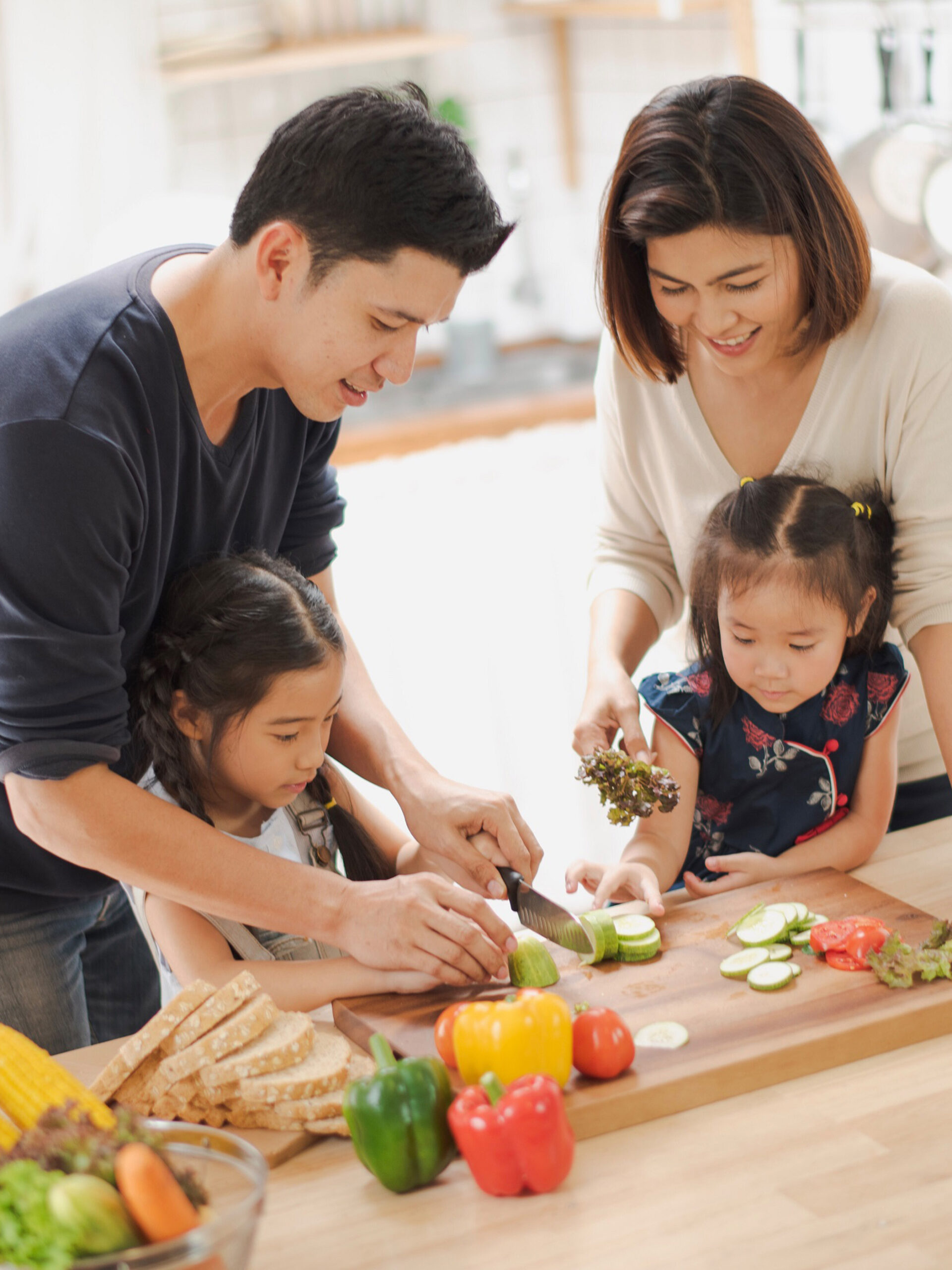 family cooking together, chopping veggies - high fiber recipes for kids from CHOC's nutrition team