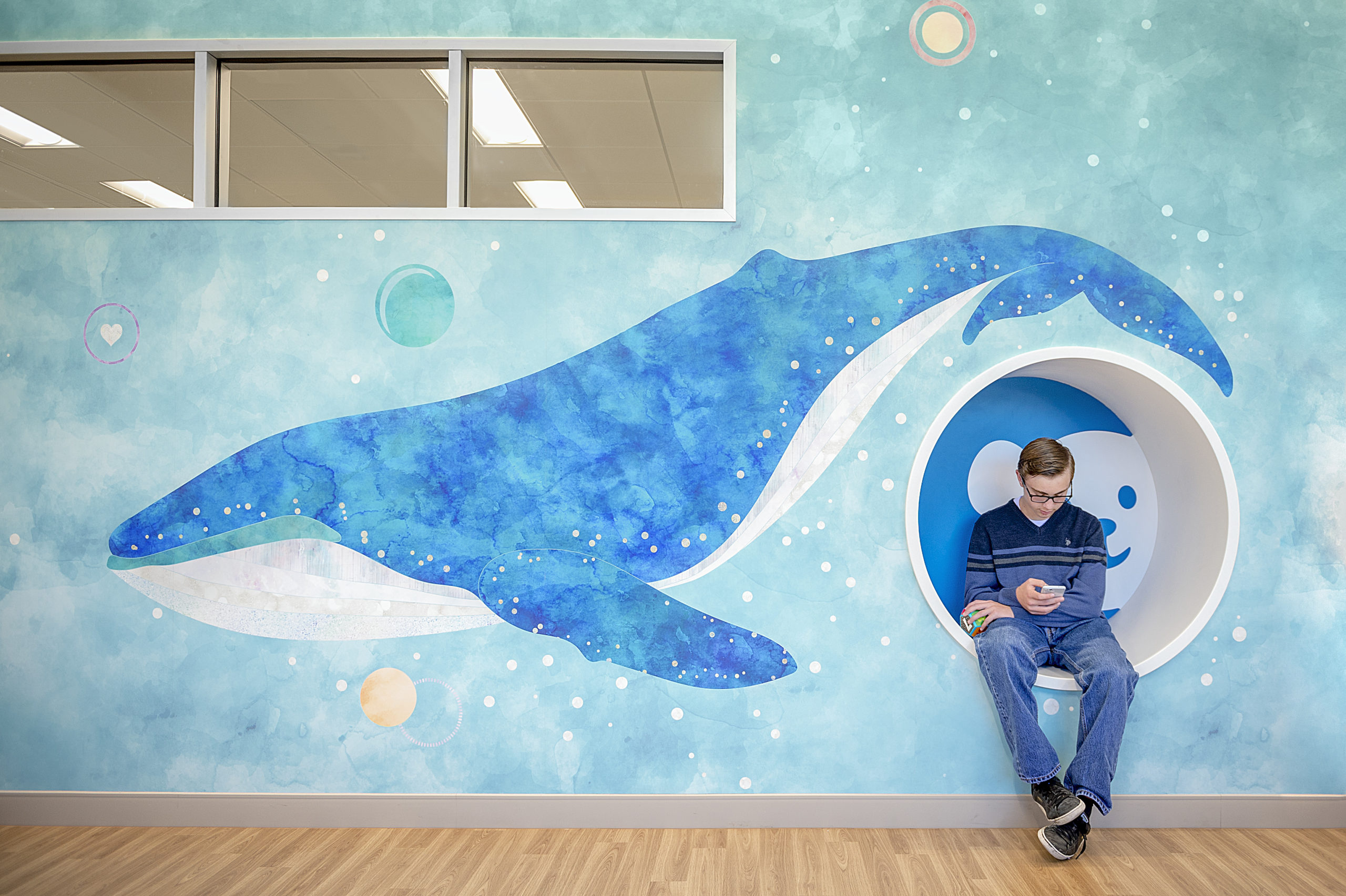 CHOC Autism center artwork with giant blue whale