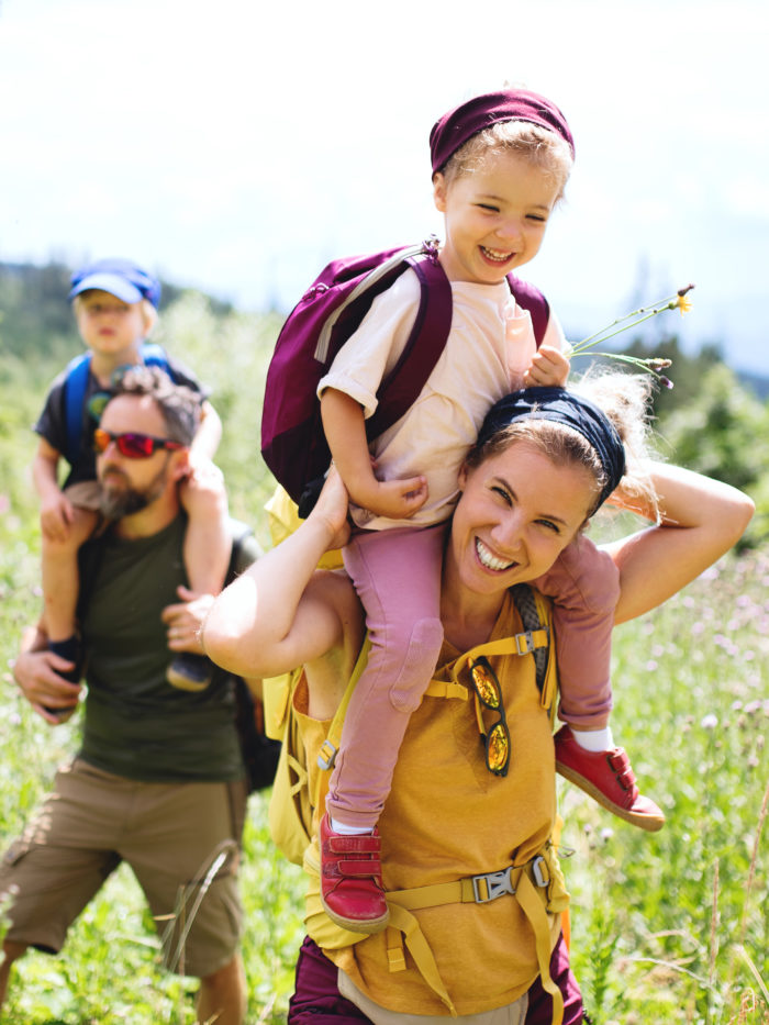 preventing burnout happy family on hike together