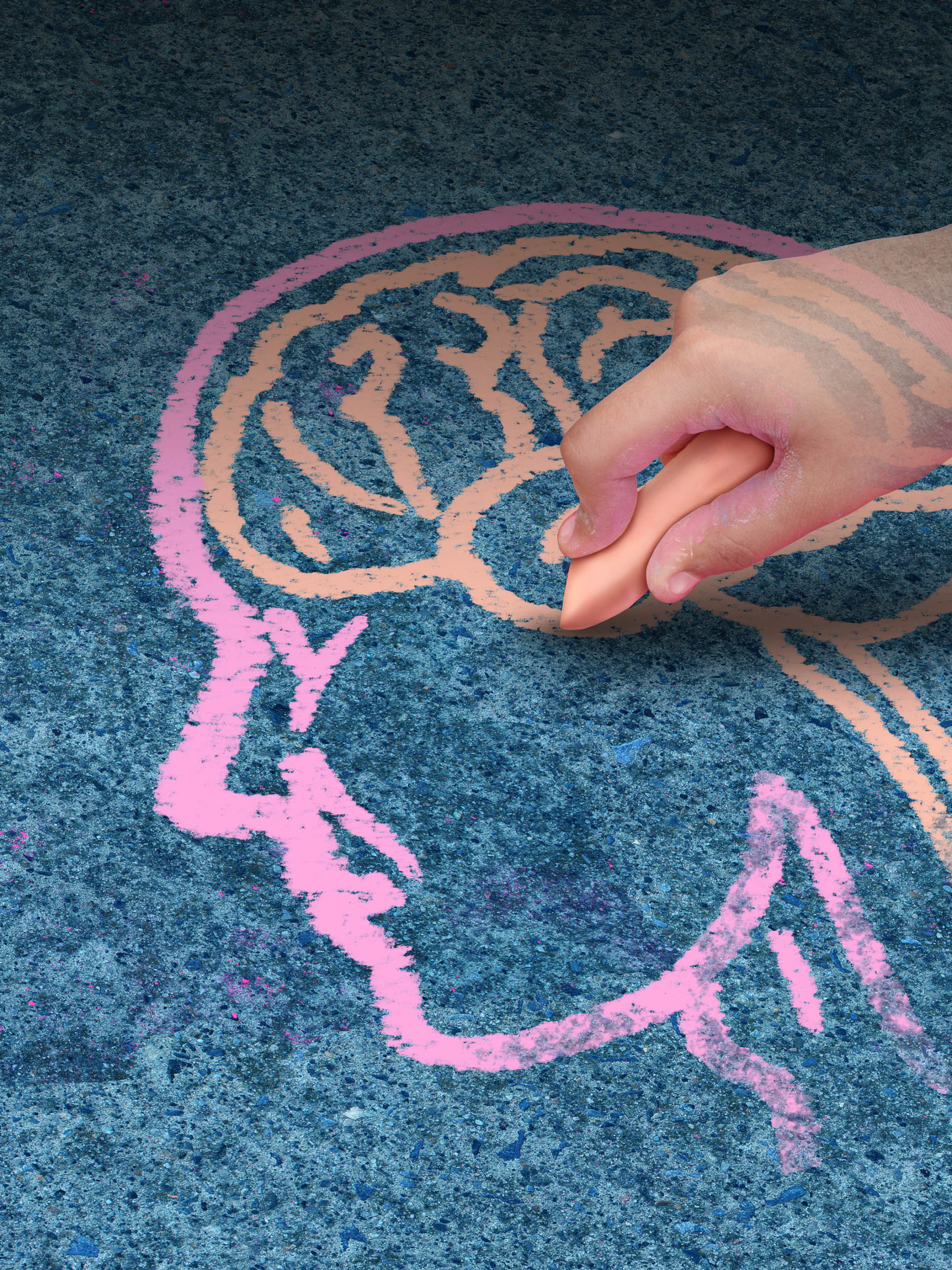 hand of a child drawing a human head and brain with chalk on a cement floor