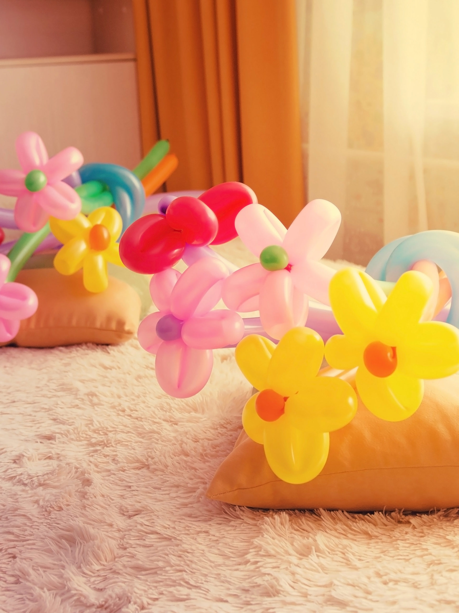 flowers made from balloons on bed in hospital