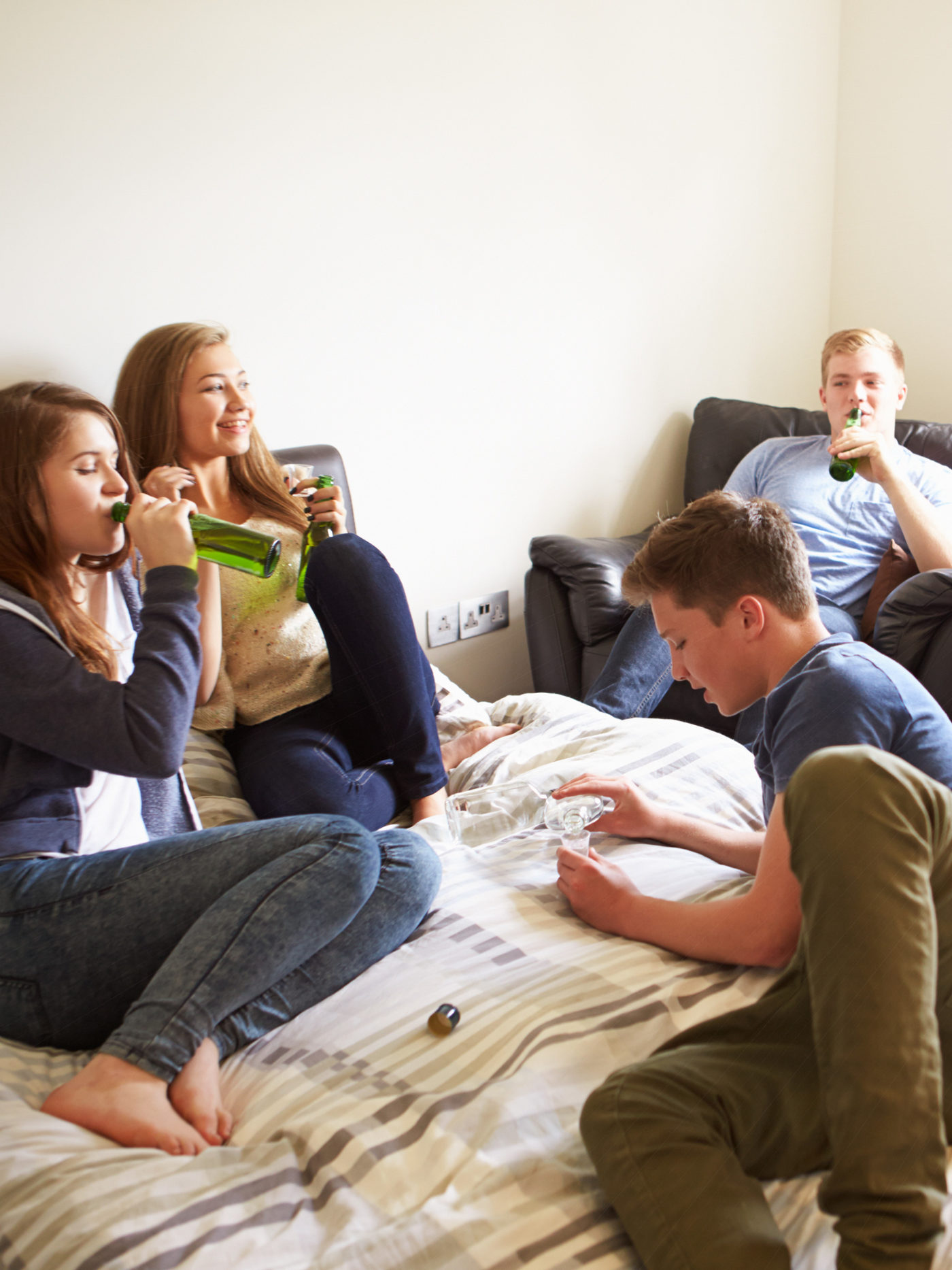 4 kids drinking in teen's bedroom