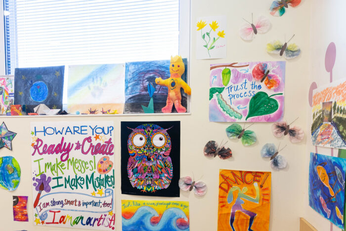 art hangs on the walls at the art therapy studio at CHOC