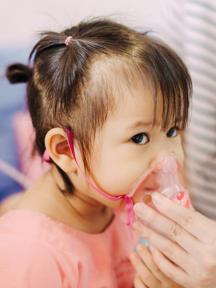 child uses breathing treatment forrespiratory illness
