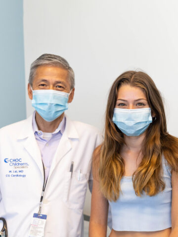 Dr. Wyman Lai, CHOC cardiologist, and Aubrey at a recent appointment at CHOC