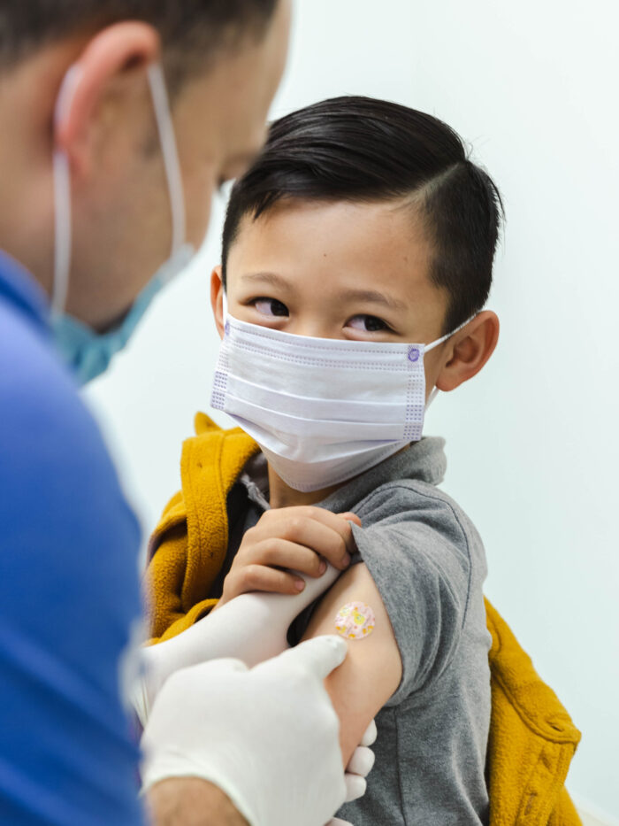 Child receives flu shot at CHOC