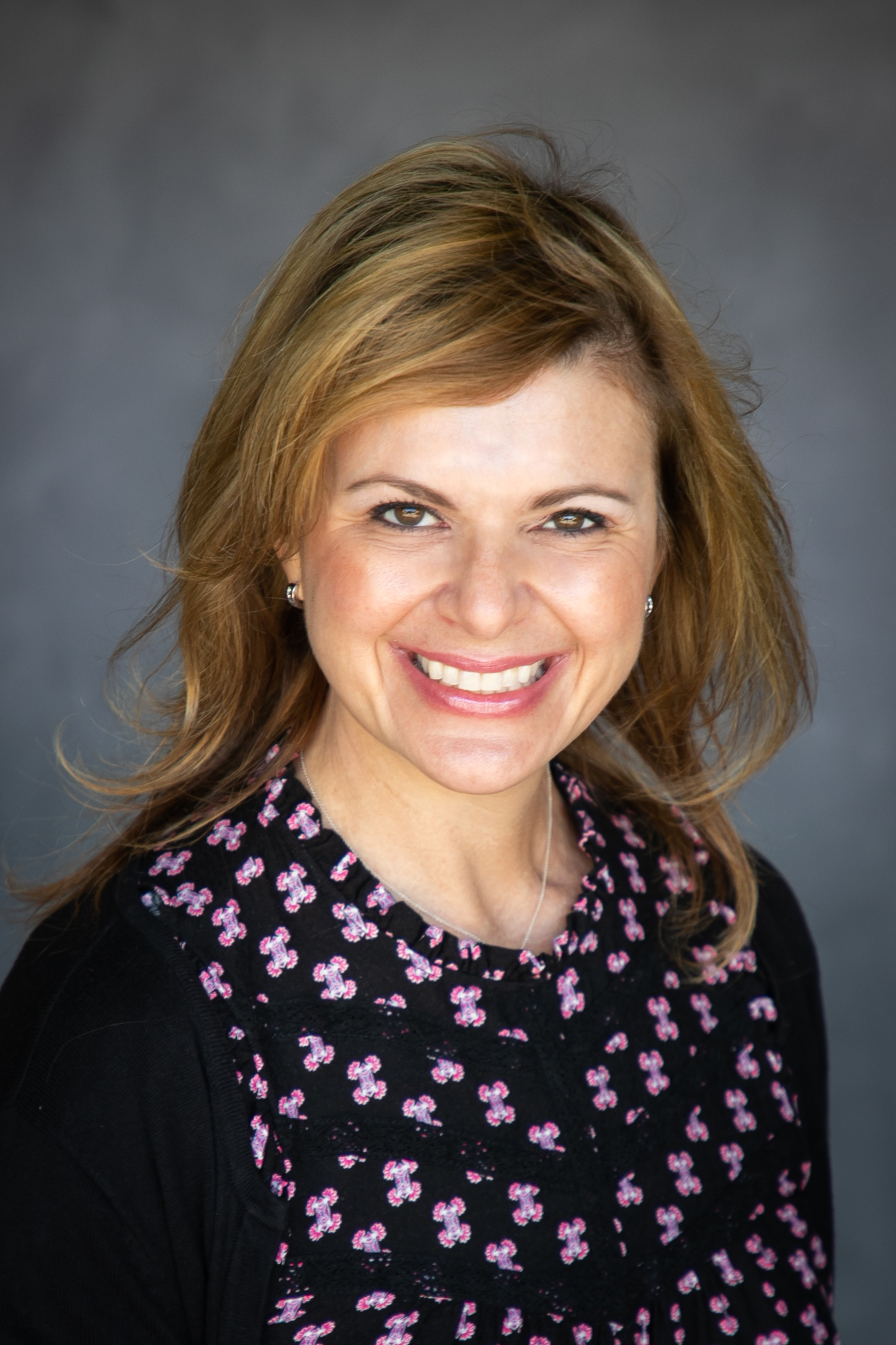 Headshot - Dr. Rebecca Ba'Gah - a board-certified pediatrician and a pediatric psychiatrist