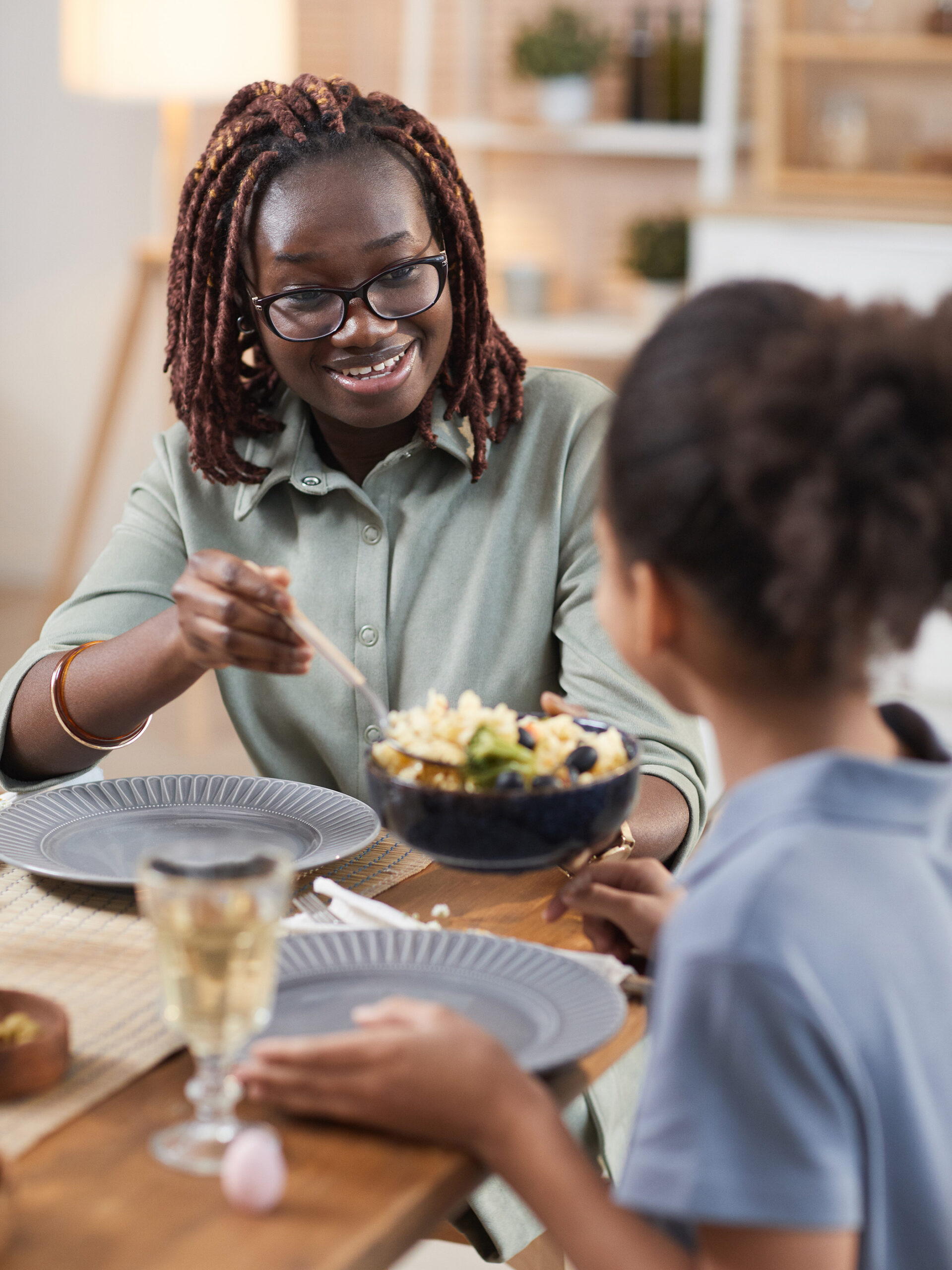 Parent offers child dish - CHOC podcast helps parents of picky eaters