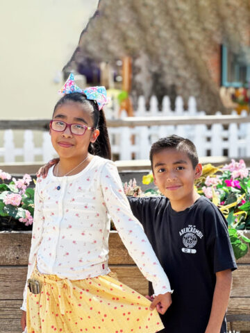 Siblings Julissa and Joseph pose together and smile. Both were diagnosed with congenital health defects and treated at CHOC