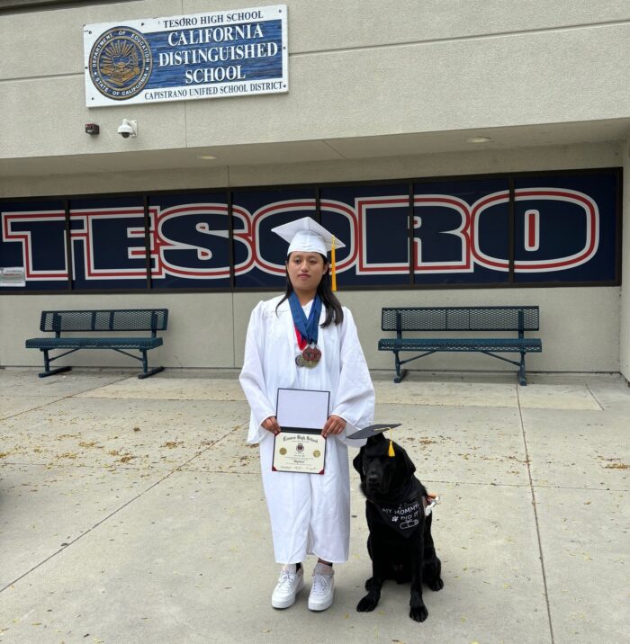 Lynn with Busby at her recent graduation from Tesoro High School