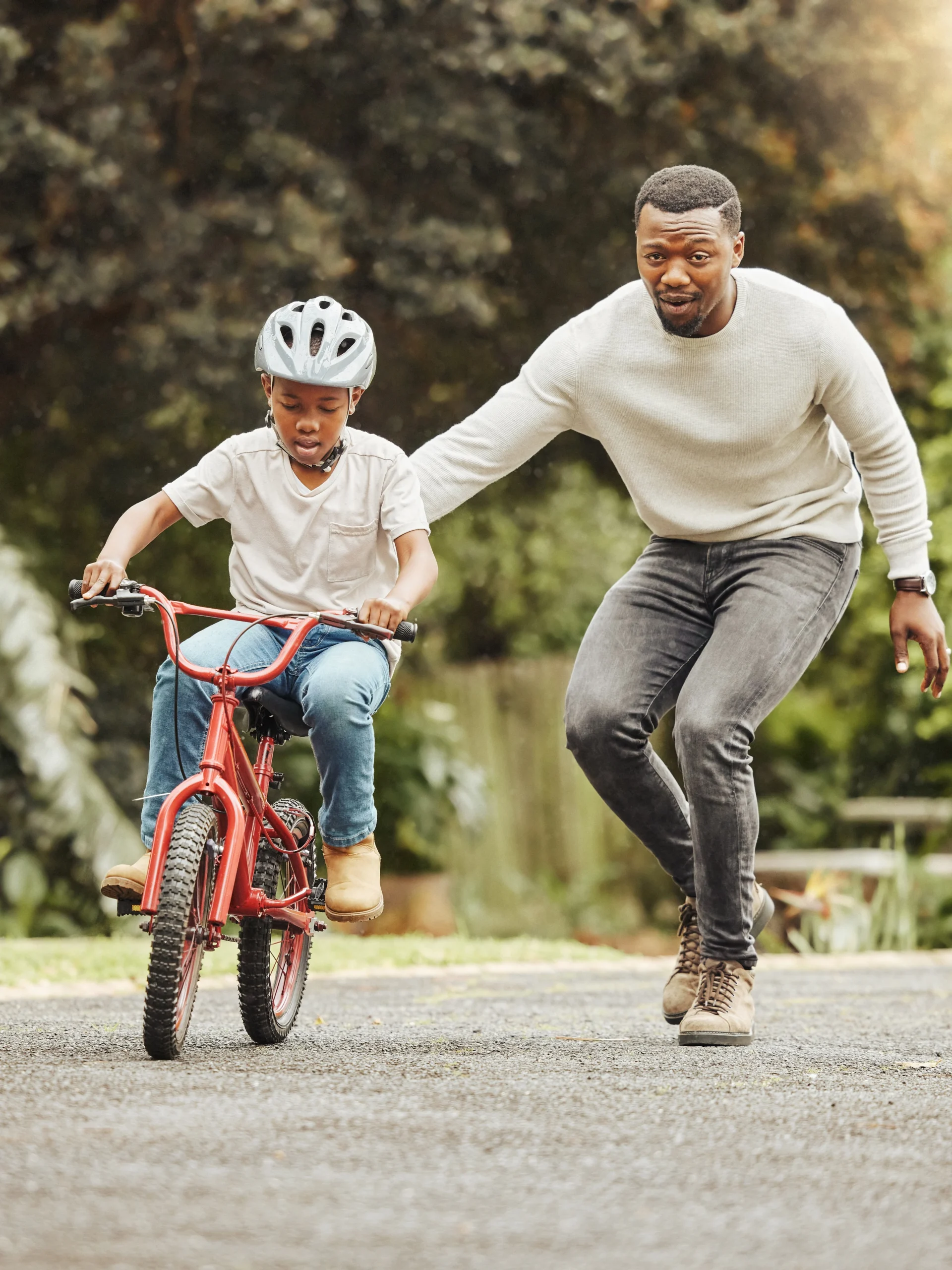 Parent and son bike riding