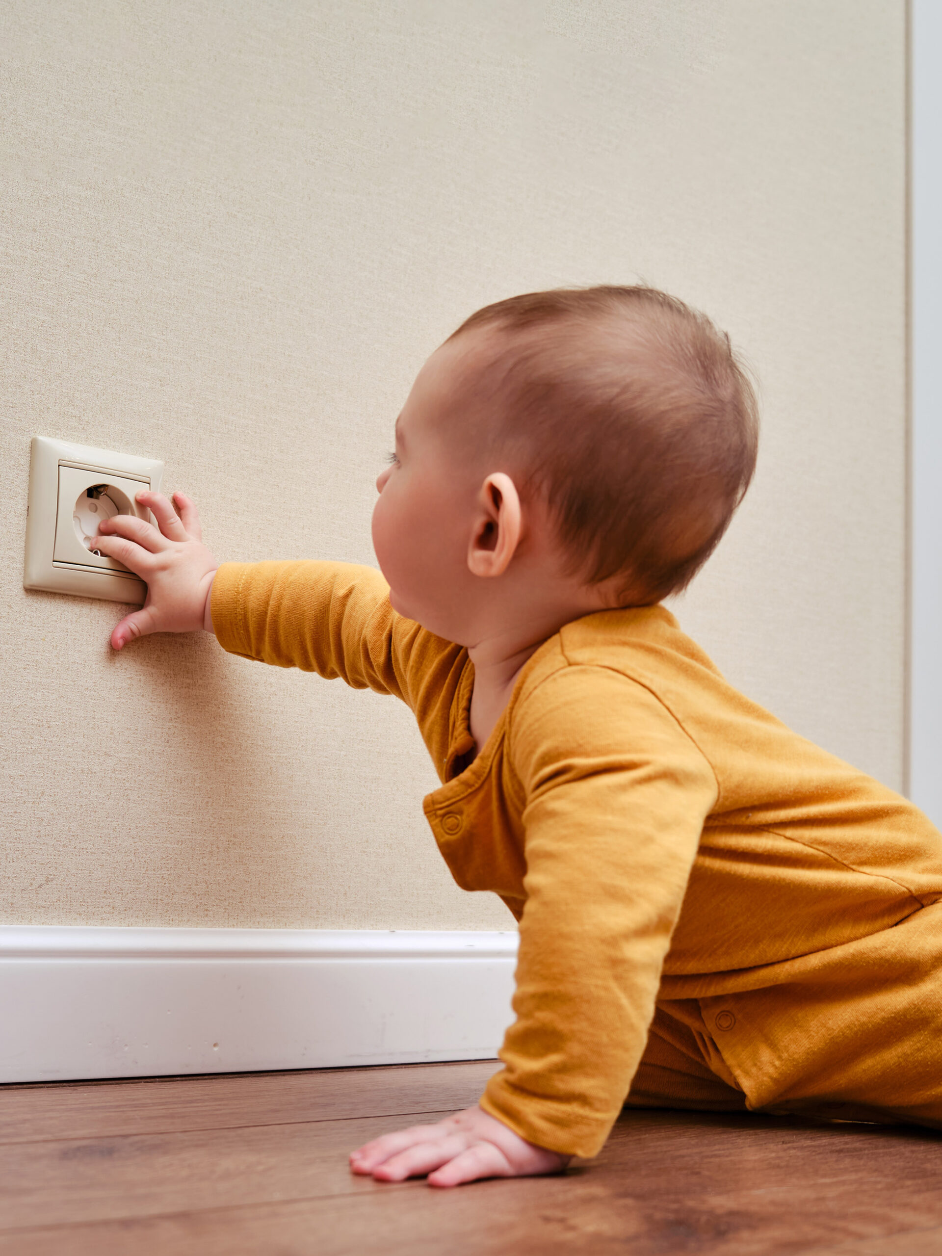 Baby puts hand on electric socket in home - home safety tips from CHOC