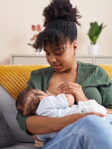 tips for successful breastfeeding - parent breastfeeding newborn