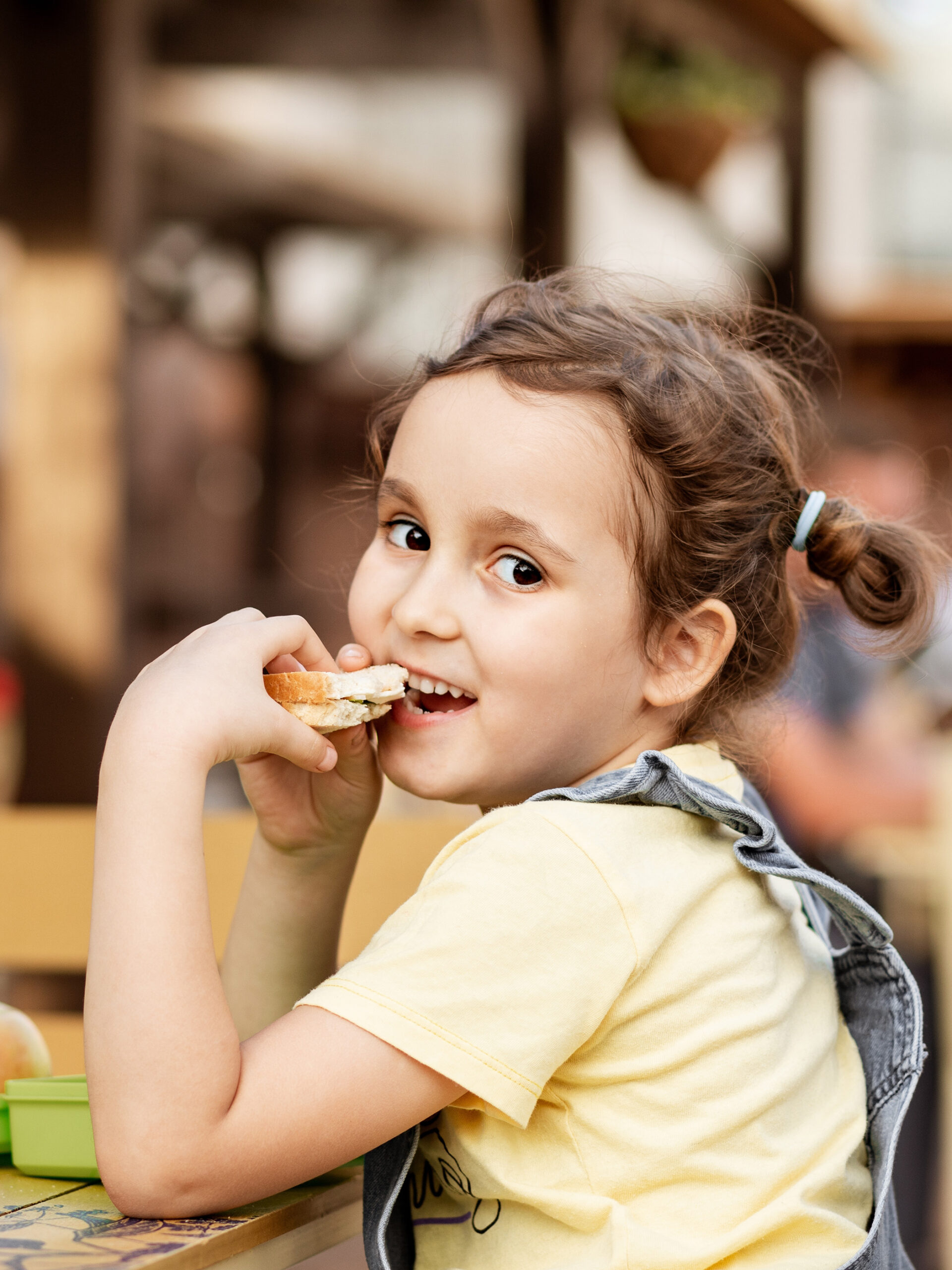 Grade-school-aged child eating