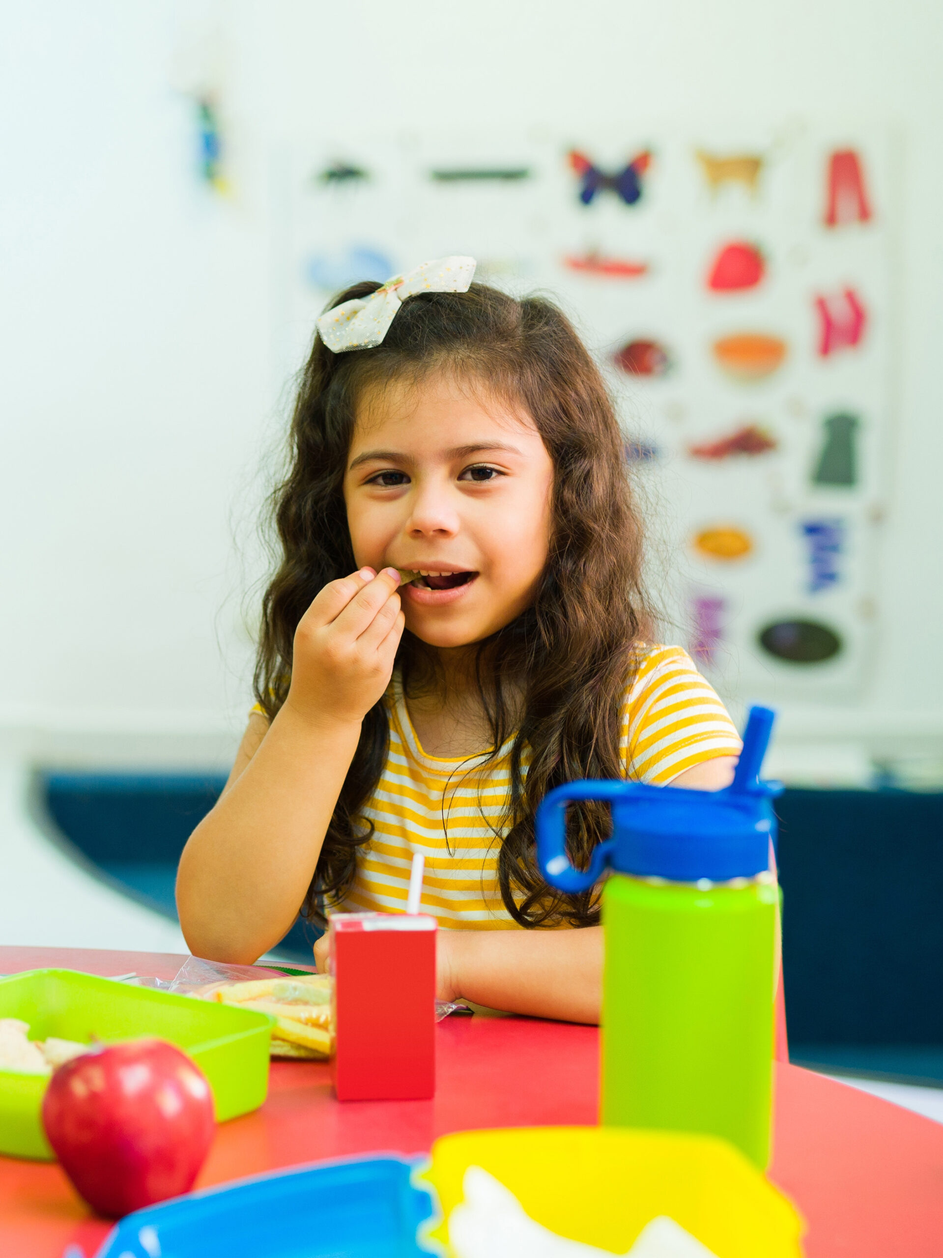 Elementary-school-aged child eating