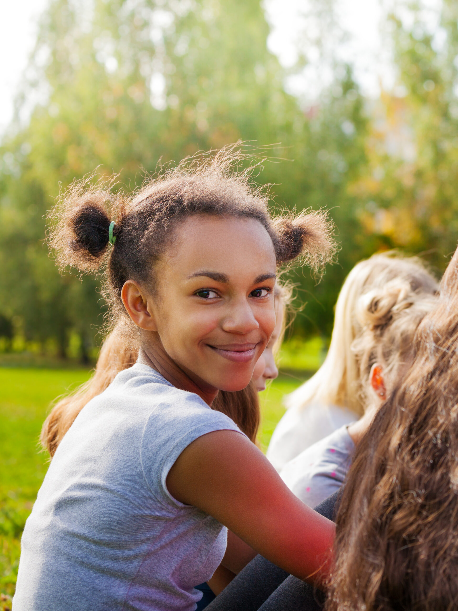 Girl smiles at camera