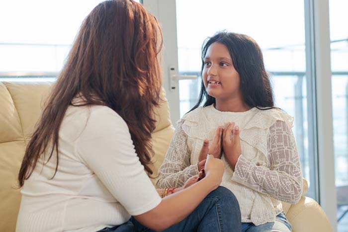 Child and mom talking to each other 