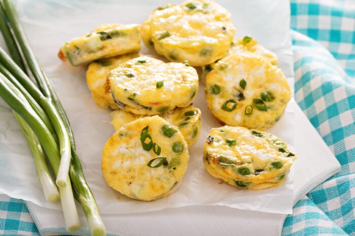 Mini frittatas with peas, green onion and feta cheese