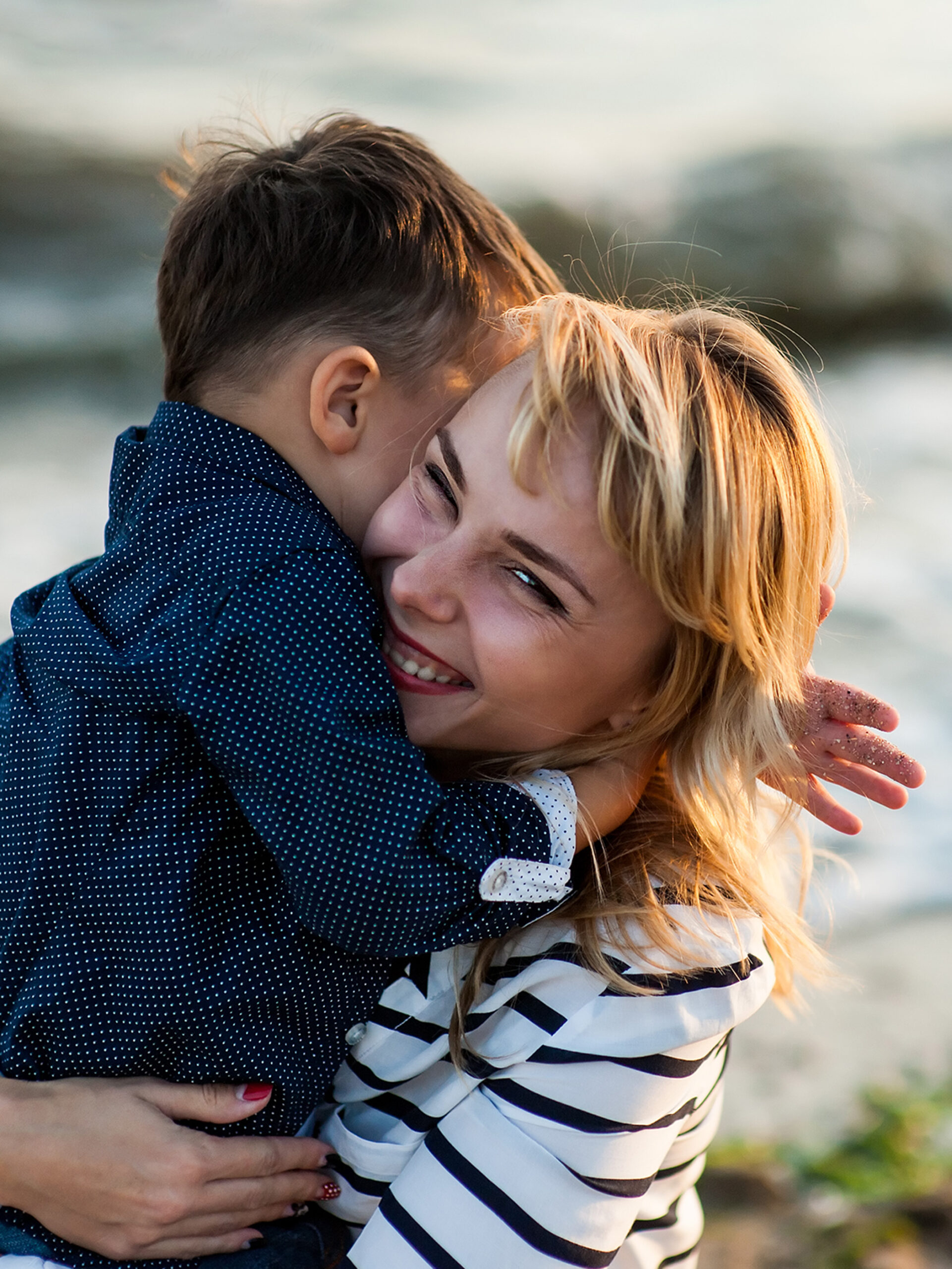 Woman hugging child