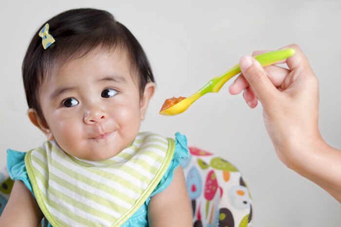 baby spoon-feeding