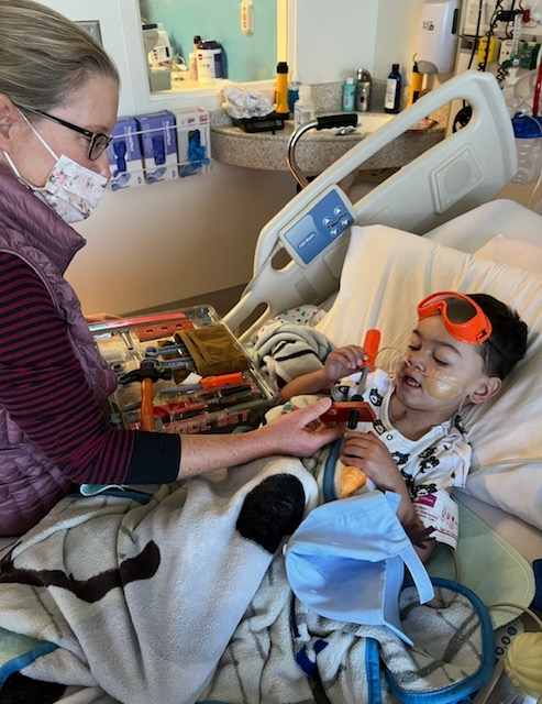CHOC CVICU nurse Cynthia with patient, Elijah