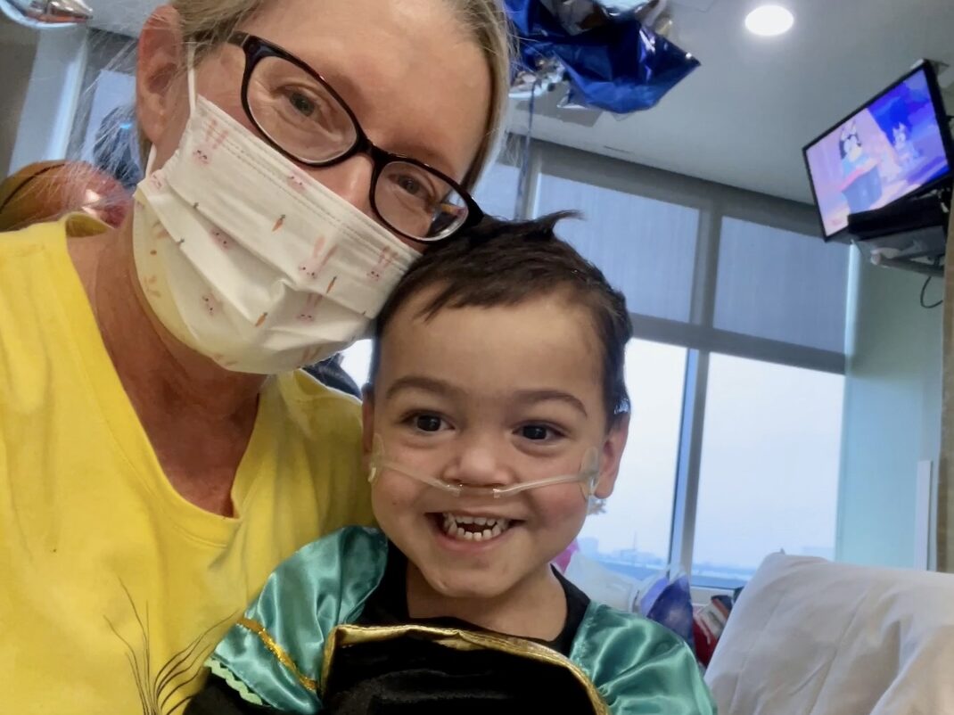Selfie of Cynthia with patient, Elijah