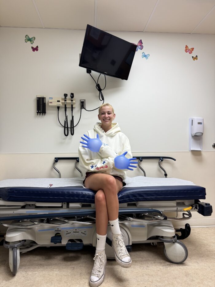 Just a month post-chemo, Zoe rocks her bold style and cropped blonde hair.