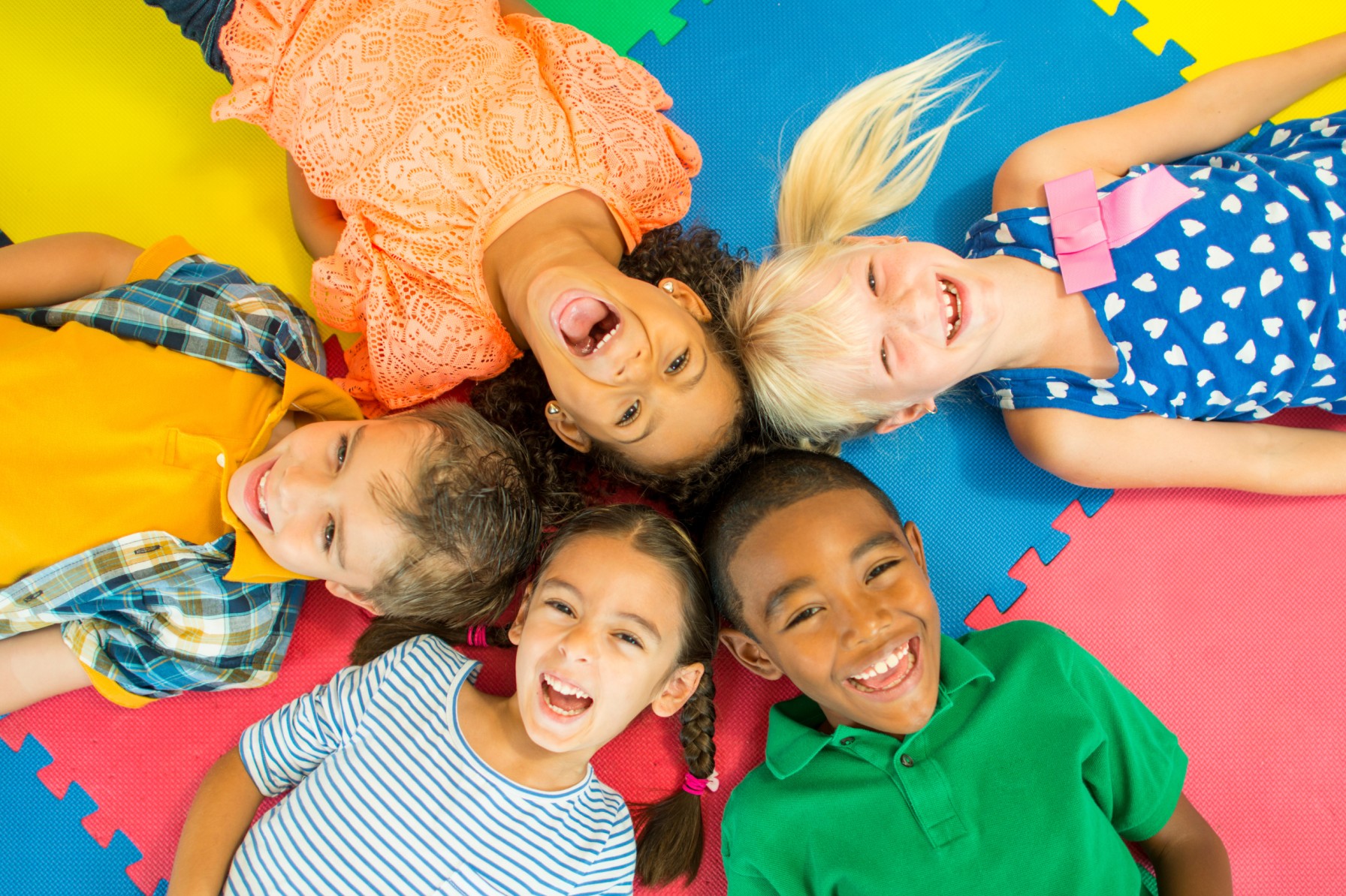 Kids bonding together and smiling while having fun