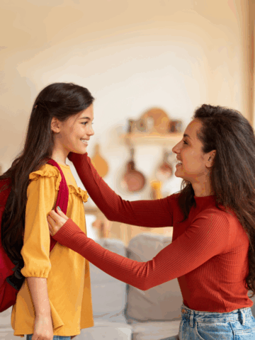 Mom sending her child to school