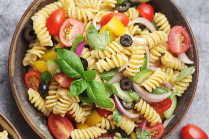 A bowl with traditional Italian pasta salad